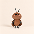 A cute, soft plush toy of a brown beetle or bug character, standing against a solid, warm off-white background.