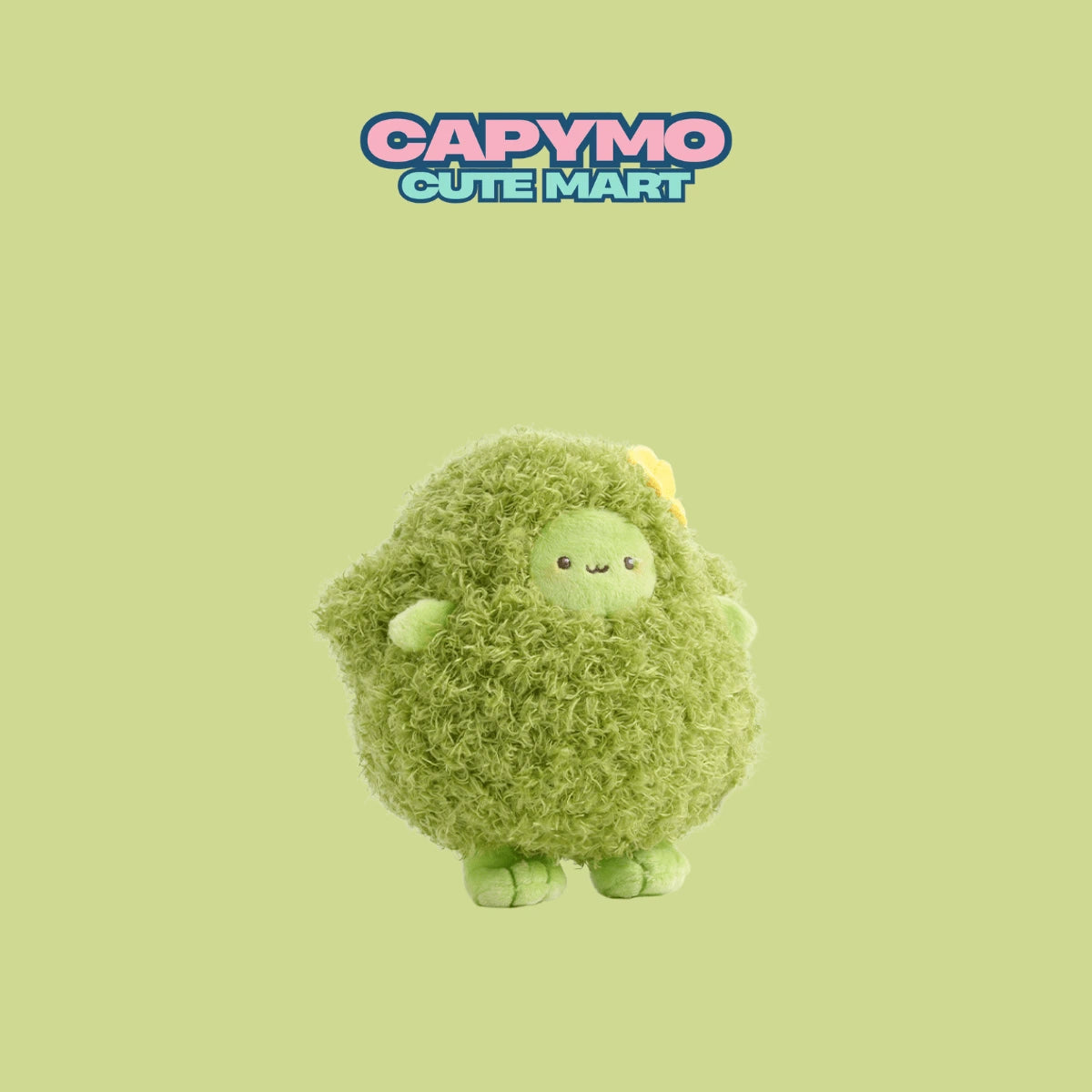 Green plush toy with a yellow bow on a light green background, featuring 'Capymo Cute Mart' text.